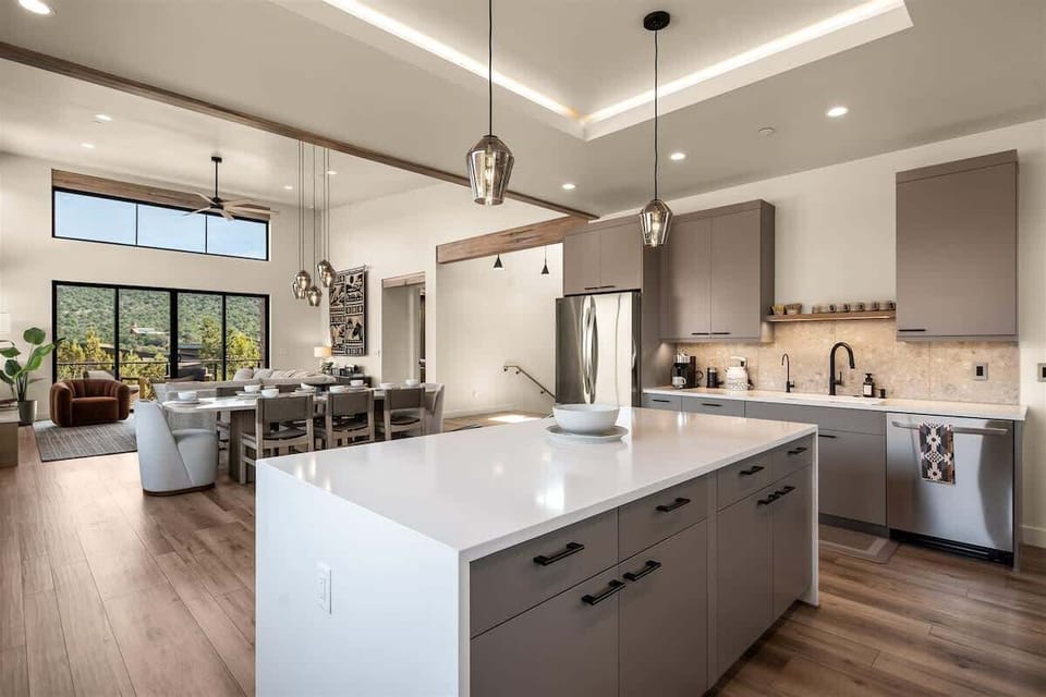The perfect chefs kitchen opens to the dining and living room to cook and be with loved ones