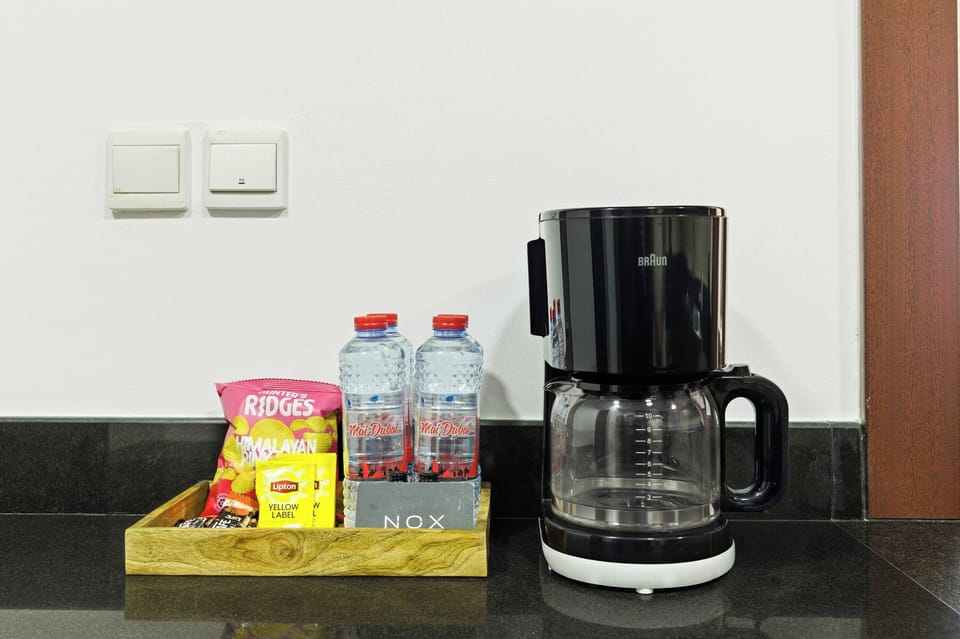 Deluxe Apartment, Balcony, Sea View | Coffee and/or coffee maker