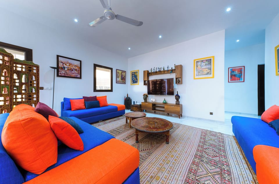 Comfort Quadruple Room, Resort View | Living area