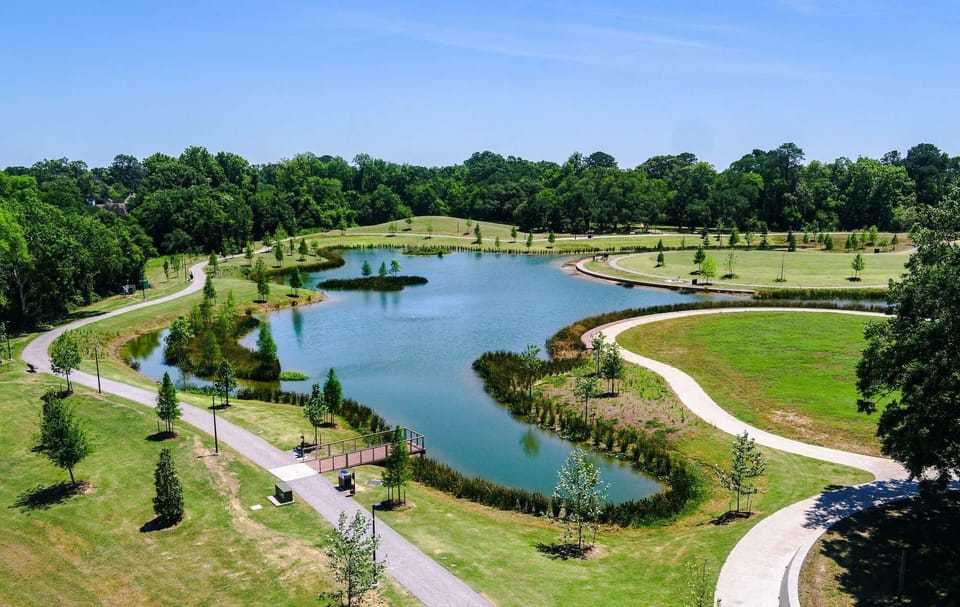 Relax at Moncus Park and enjoy walking trails, open lawns, a dog park, and community events in a beautiful green space.