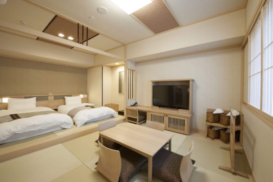In-room safe, desk, WiFi (free), bed sheets