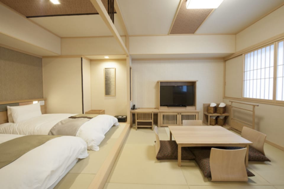 In-room safe, desk, WiFi (free), bed sheets