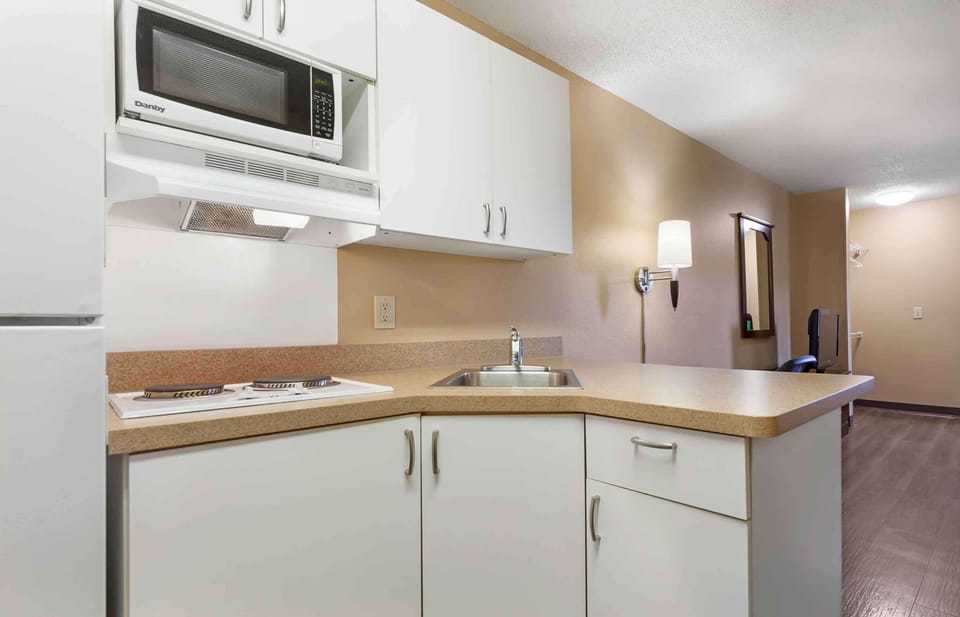 Studio, 1 King Bed, Non Smoking | Private kitchen | Fridge, microwave, stovetop, coffee/tea maker