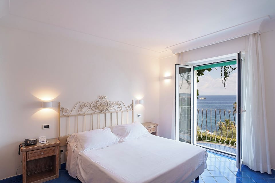 Comfort Double Room, Sea View | In-room safe, desk, free WiFi, bed sheets