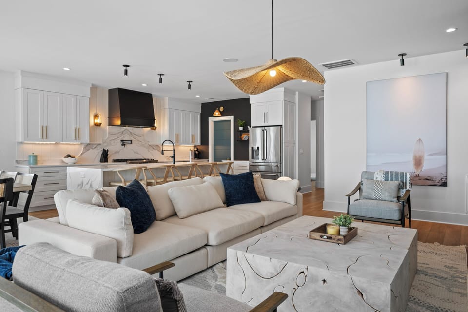 Unwind in your elegant open-plan living space where modern comfort meets sophisticated design, perfect for relaxing after exploring the city.