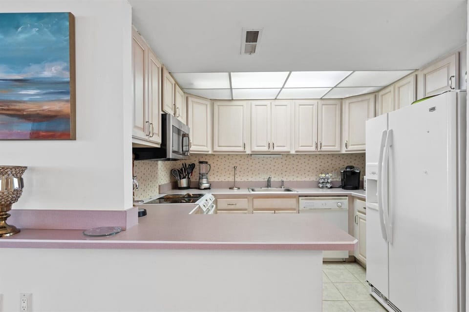 A spacious kitchen with modern appliances
