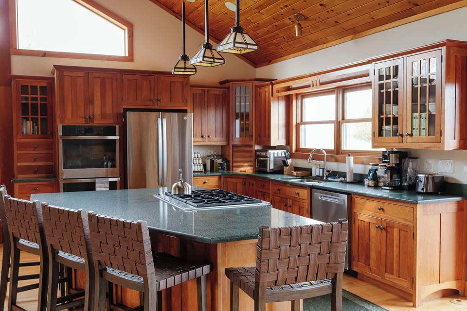 Gather around the island as dinner comes together, creating the perfect space for conversation and connection.