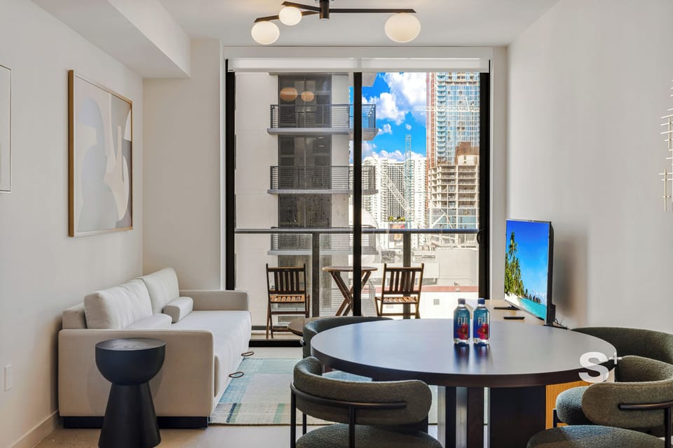 Condo, Balcony, City View | Living area | TV
