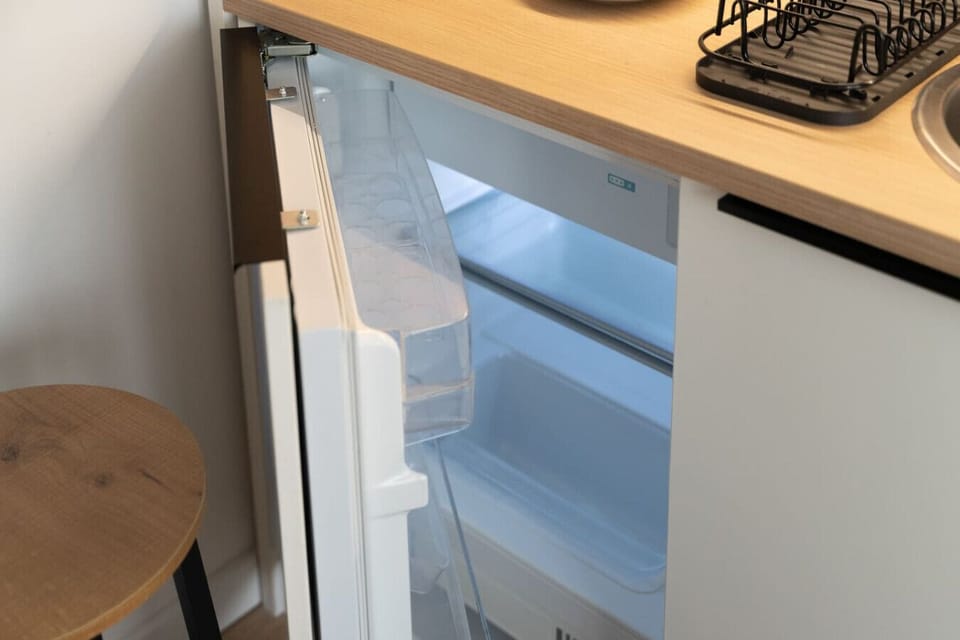 Compact Refrigerator for Your Food & Drinks Convenience | Book Now with RENTUJEMY.COM