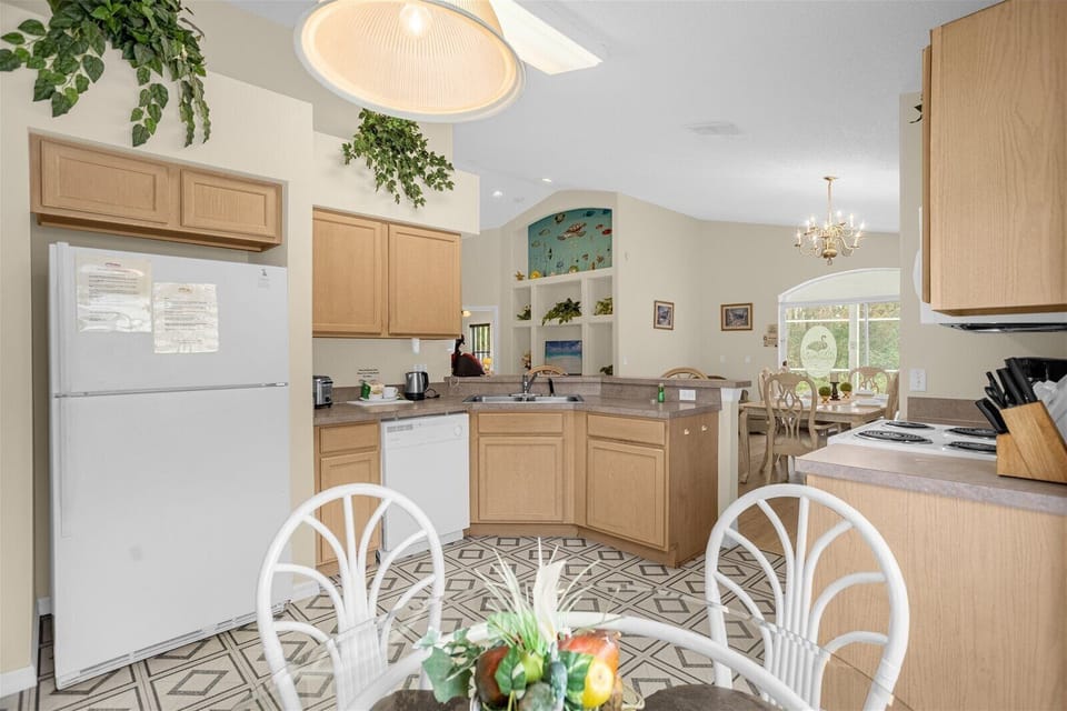 Kitchen Area With Full Size Fridge, Dishwasher & Stove