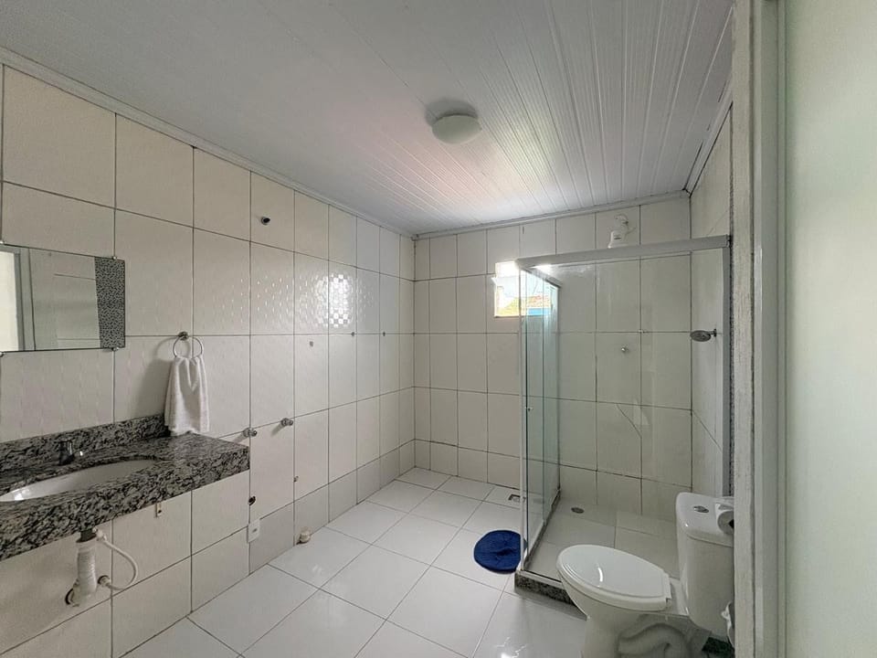 Shower, towels, soap, toilet paper