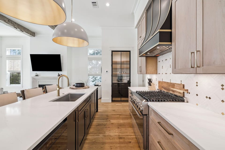 Your gourmet kitchen awaits with premium appliances, marble countertops, and an open design perfect for cooking memorable meals together.