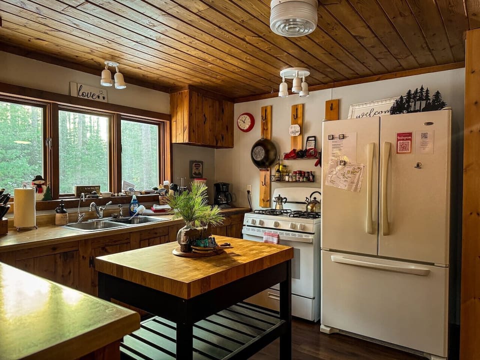 Well stocked kitchen & pantry | Icemaker in freezer | Please note: No dishwasher, but great views from the kitchen sink!