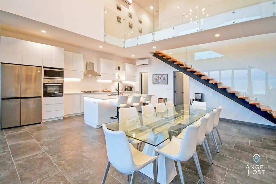 The dining table, designed to accommodate 10 guests, is perfect for family dinners.
