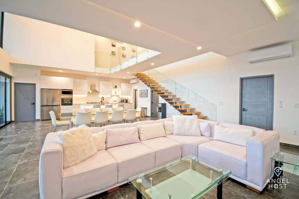 Relax on the spacious, comfortable sofa in the living room.