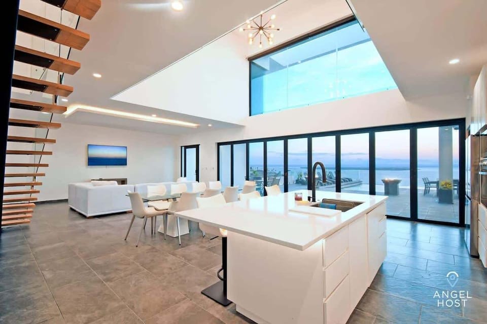 An open-concept design with a spacious kitchen and comfortable living room.