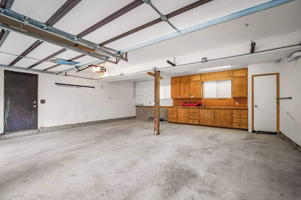 Space is available for up to four vehicles, including two garage space​s