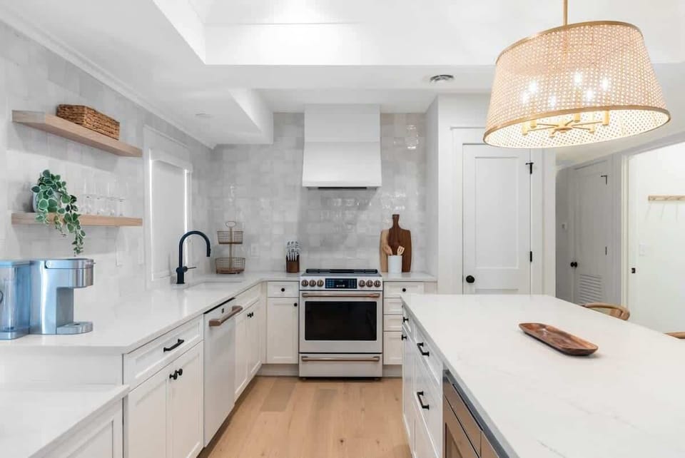 Cook, gather, and dine in the spacious kitchen featuring modern appliances and plenty of counter space.