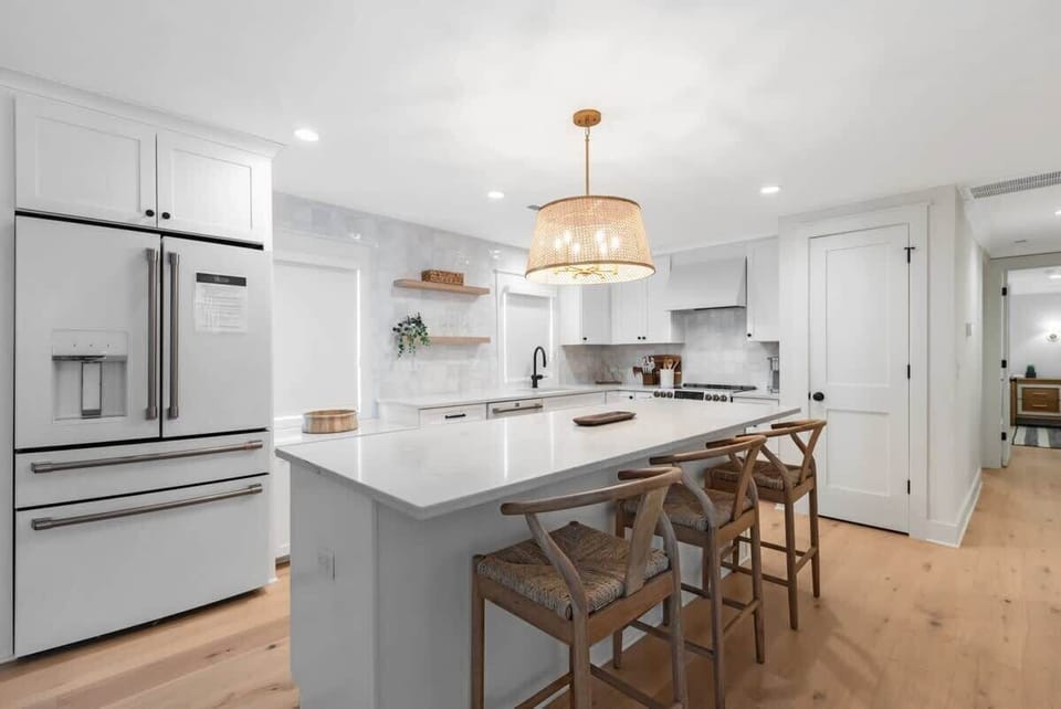 Have a few drinks at the kitchen island while watching the designated chef in action.