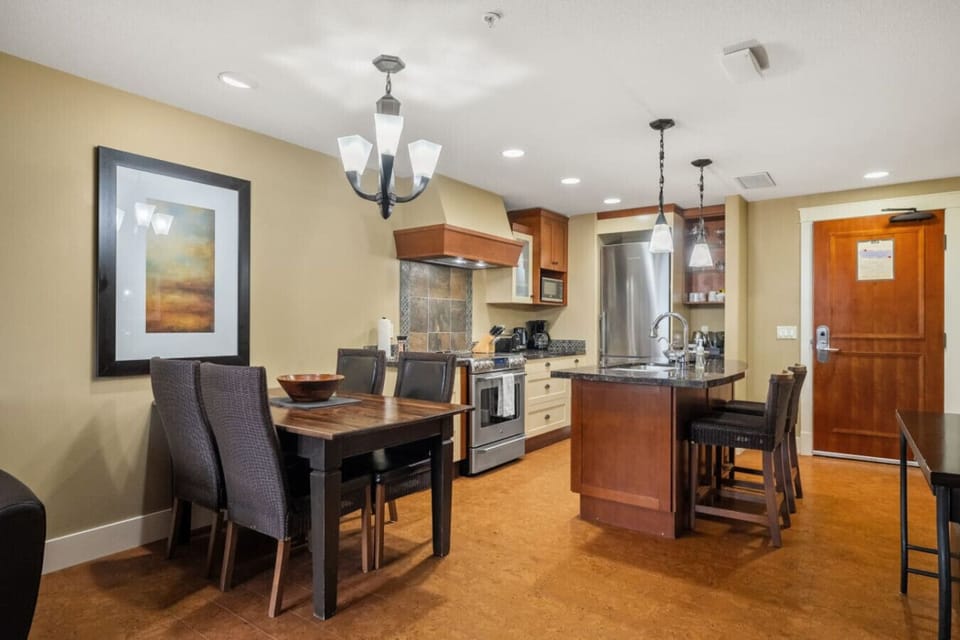 Your kitchen opens up to the spacious living and dining areas.