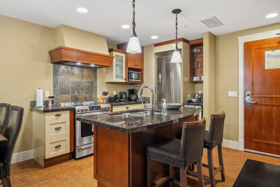 The spacious, modern kitchen with a large central island.