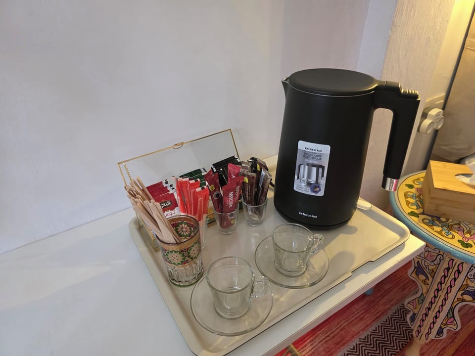 Luxury Double Room, Courtyard View | Coffee and/or coffee maker