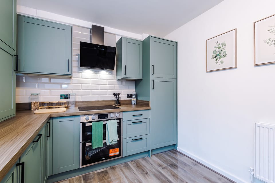 Kitchen Delight: Modern design with sleek appliances and charming decor for culinary creativity!