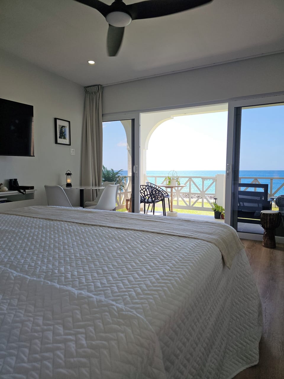 climate control, bed, patio, private space, TV, body of water views, desk, table