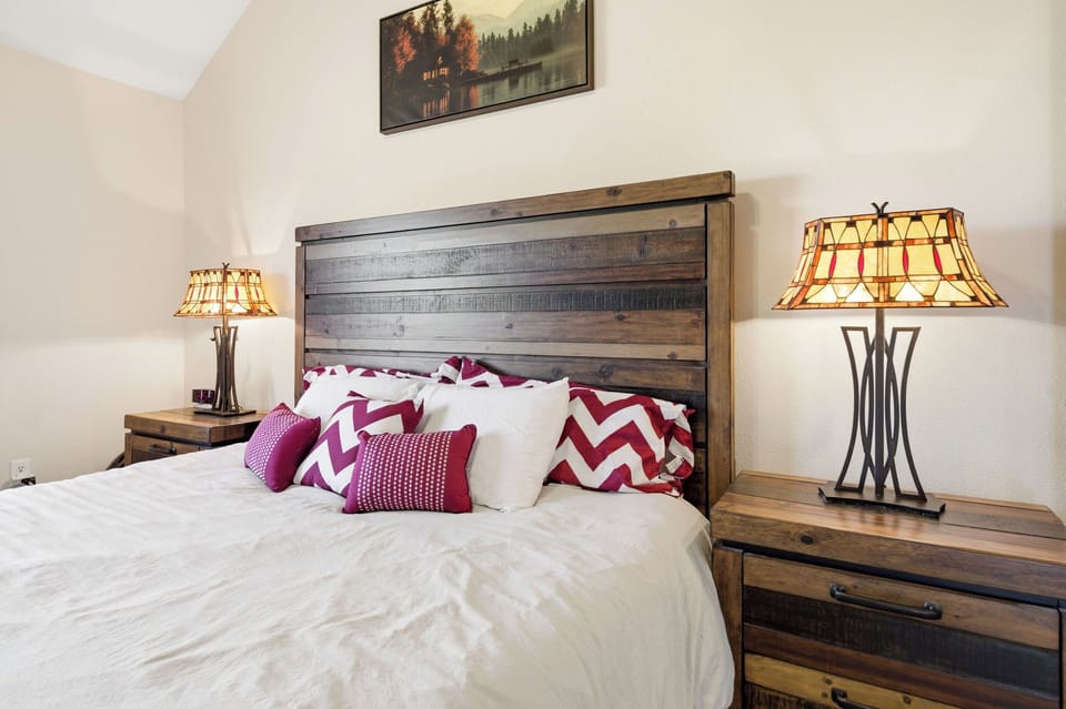 This bedroom features a full bed and comfortable mattress.