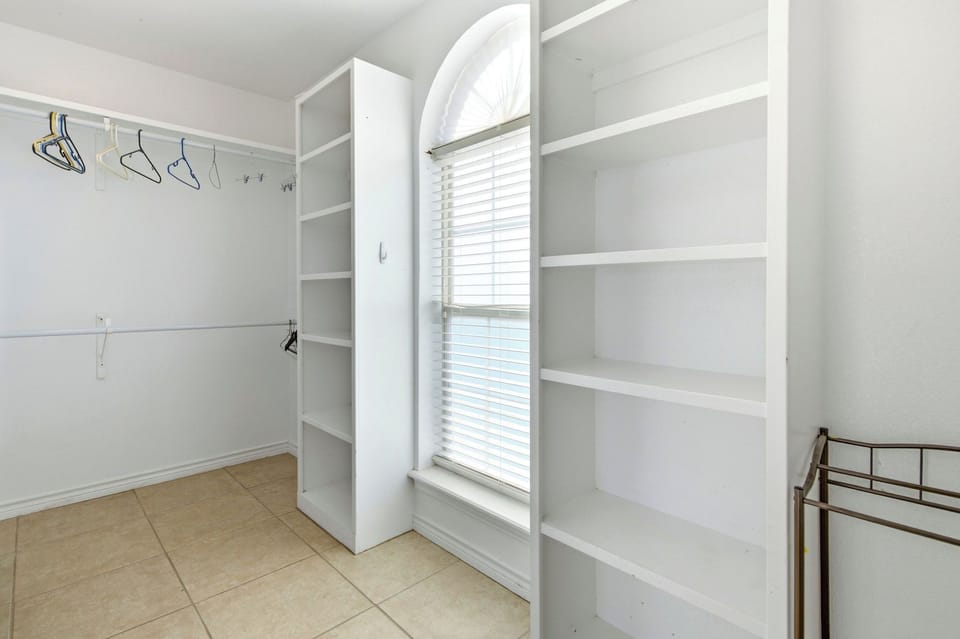 Spacious closet and wardrobe for your use.