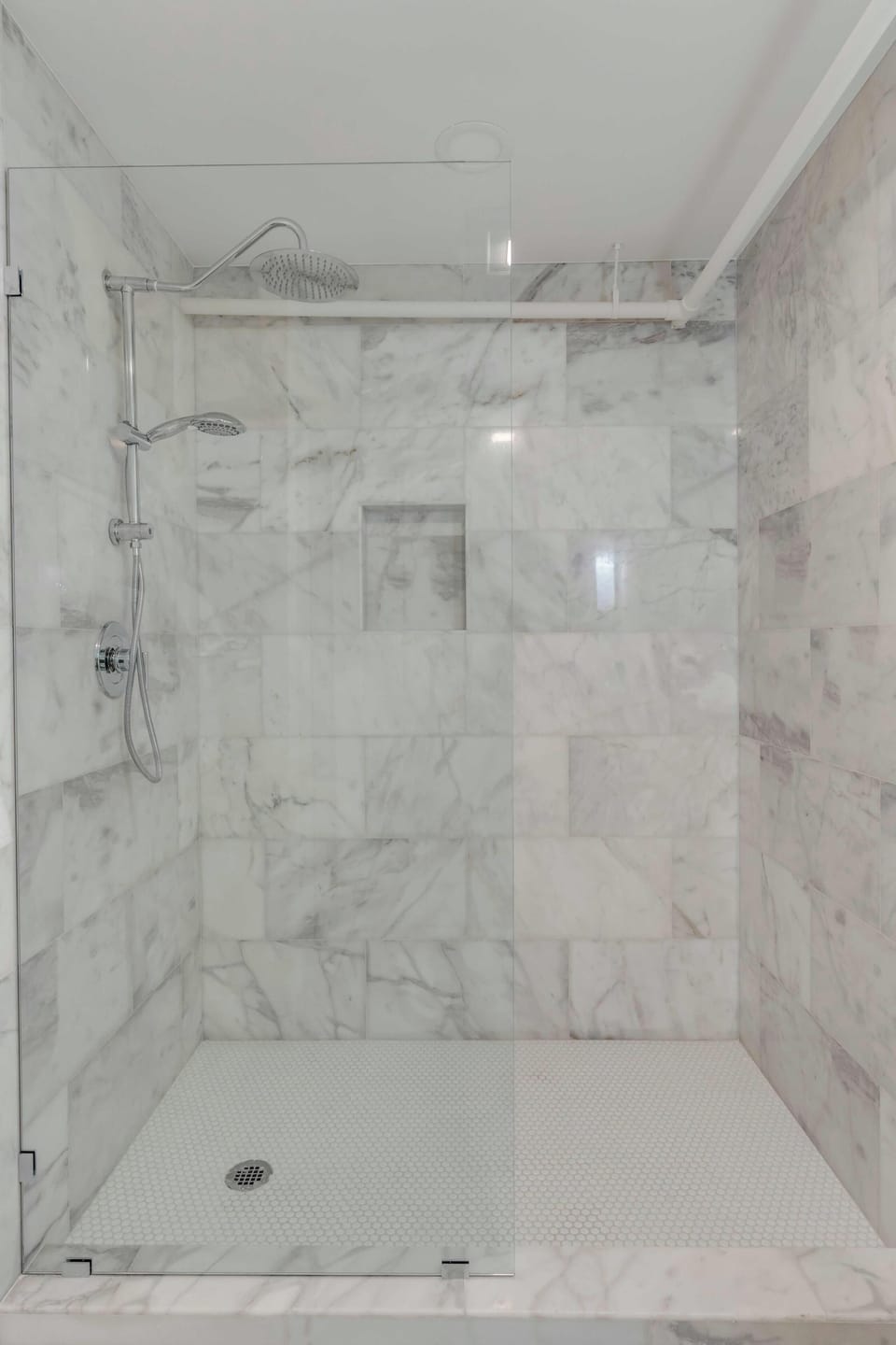 Bathroom #1: Refresh in your private ensuite bathroom featuring a spacious walk in shower and elegant finishes.
