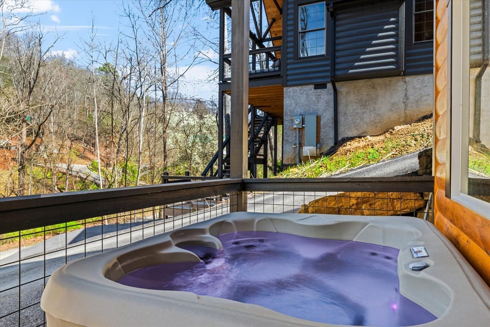 Soak in the sunshine and the views. Our hot tub is the perfect spot to enjoy a blue-sky day.