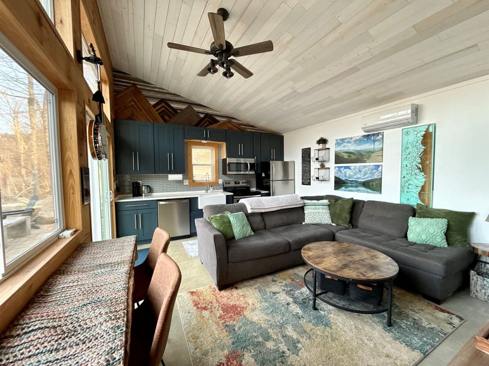 Rain on the roof, coffee in hand, and the mountains just beyond the windows-  staying in never felt so right.