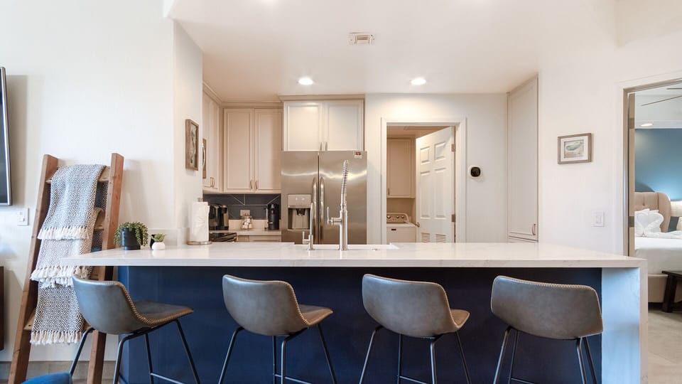 Seating at th kitchen counter.