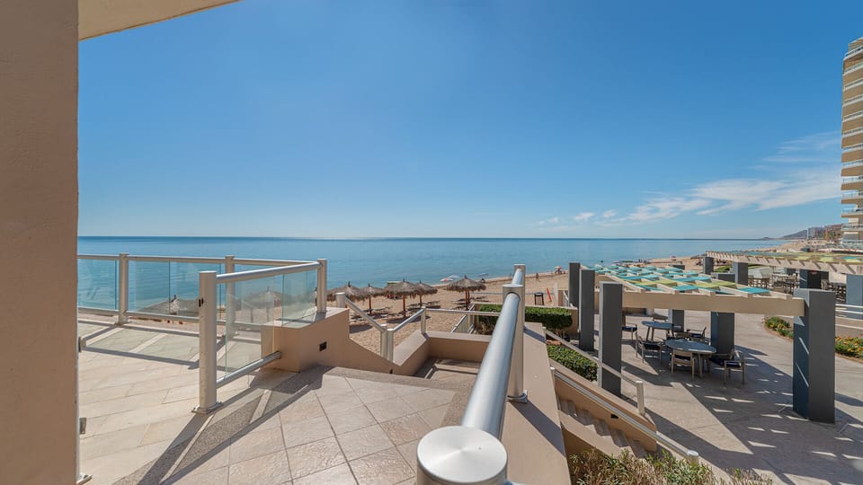 Steps from the patio to the pool area