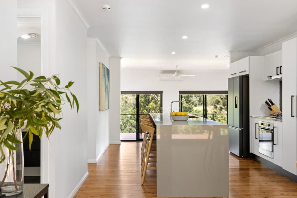 Fully equipped kitchen with breakfast bar, coffee machine and dishwasher