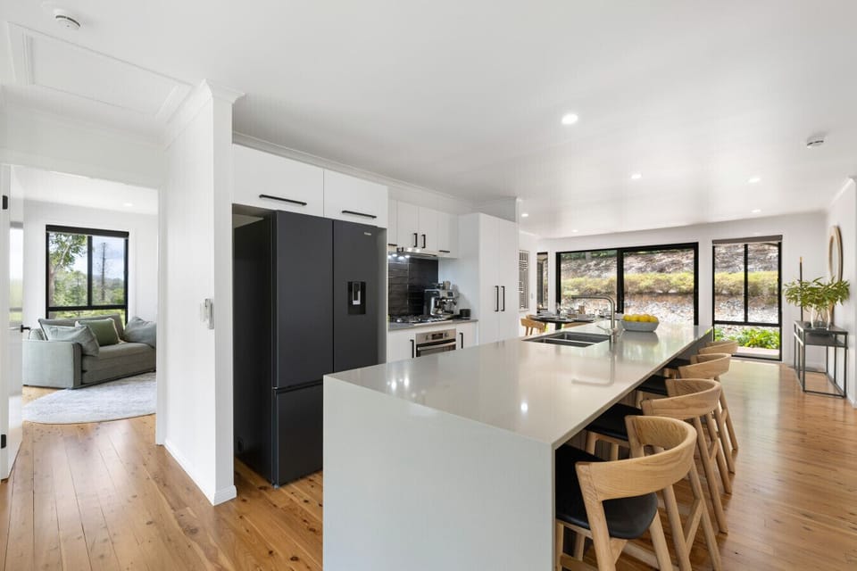 Fully equipped kitchen with breakfast bar, coffee machine and dishwasher