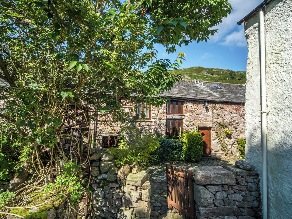 Charming stone-built cottage exterior | Hardknott Cottage - Bridge End Farm Cottages, Boot, near Eskdale