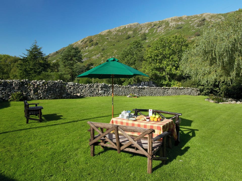 Large lawned garden with outdoor furniture | Wrynose Cottage - Bridge End Farm Cottages, Boot, near Eskdale