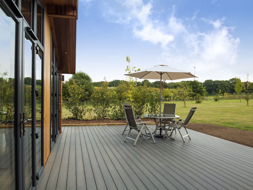 Expansive decked area | Oak Lodge - South Downs Lodges, Hassocks