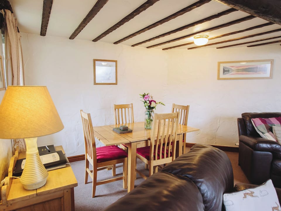 Exposed wooden beams in the living and dining room | Gelt Cottage, Castle Carrock, near Brampton