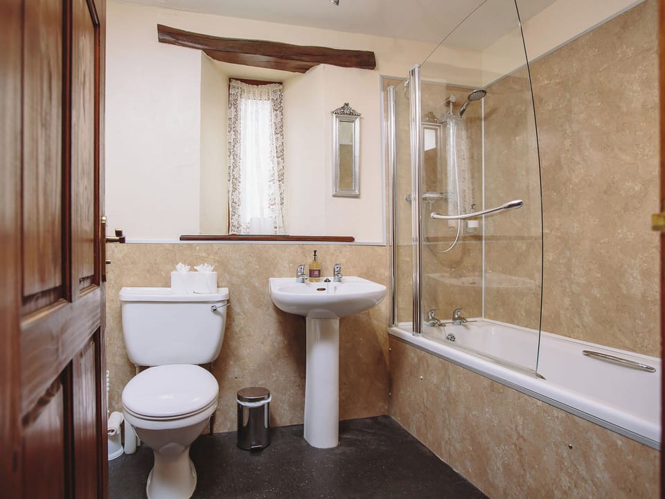 Family bathroom with shower over bath | Low Barn, Castle Carrock, near Brampton