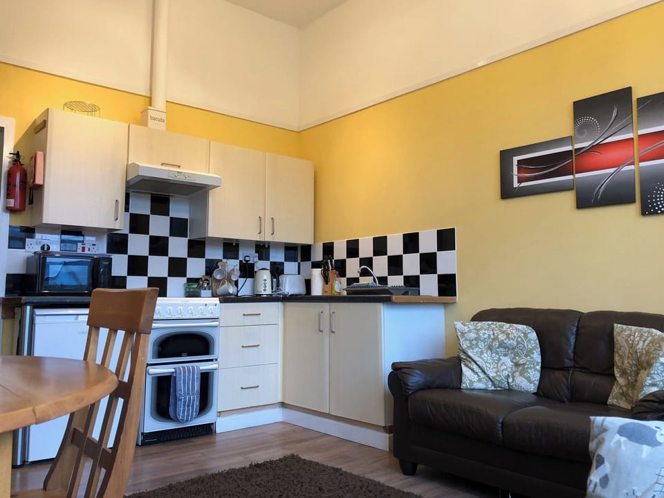 Open plan living space | Science - Old School Apartments, Dalavich