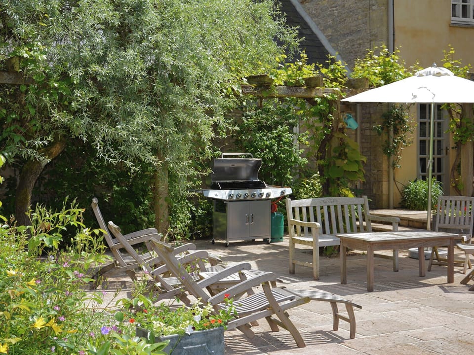 Patio with outdoor furniture | Weir House - Bruern Holiday Cottages, Bruern, near Chipping Norton