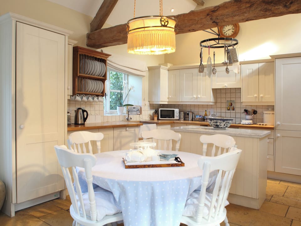 Convenient dining area within kitchen | Shipton - Bruern Holiday Cottages, Bruern, near Chipping Norton