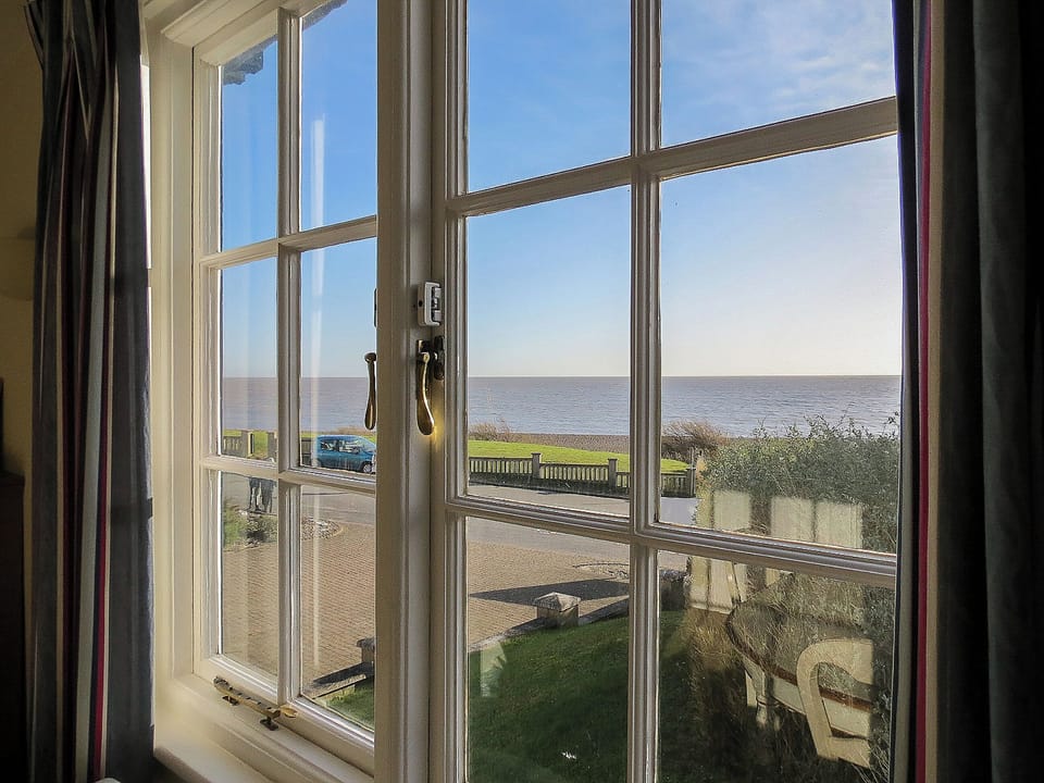 Stunning sea-view from the living room | 3 Ogilvie Lodge, Thorpeness, near Aldeburgh