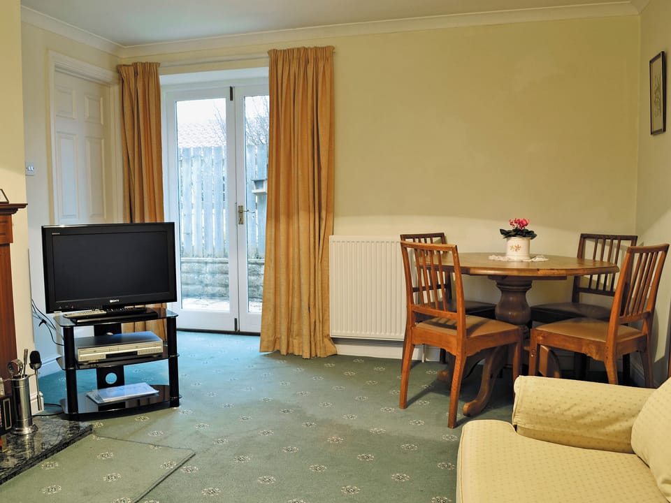 Homely living/dining room | The Arches - Home Farm Holiday Cottages, Slingsby, near Malton