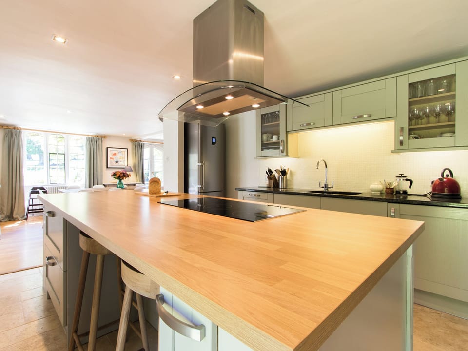 Wonderful bespoke kitchen with wood-topped island | The Dairy House, Illminster
