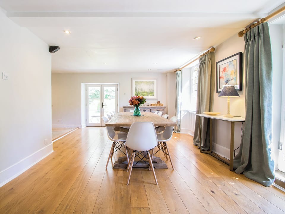 Large dining area with French doors to the garden | The Dairy House, Illminster