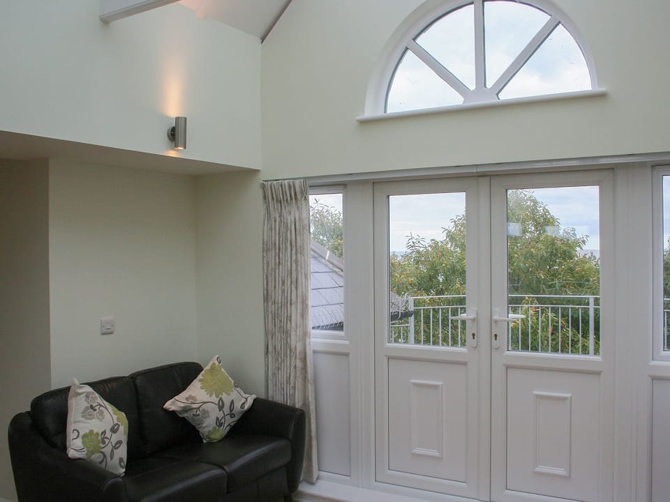 Living room with French doors at either end | Highlands Apartment 4 - The Highlands, Shanklin